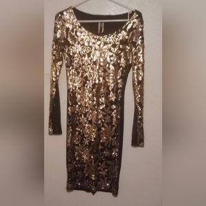 Sequined sheer black long sleeved mini-dress
